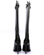 Black knee-high boots with zippers on a white background